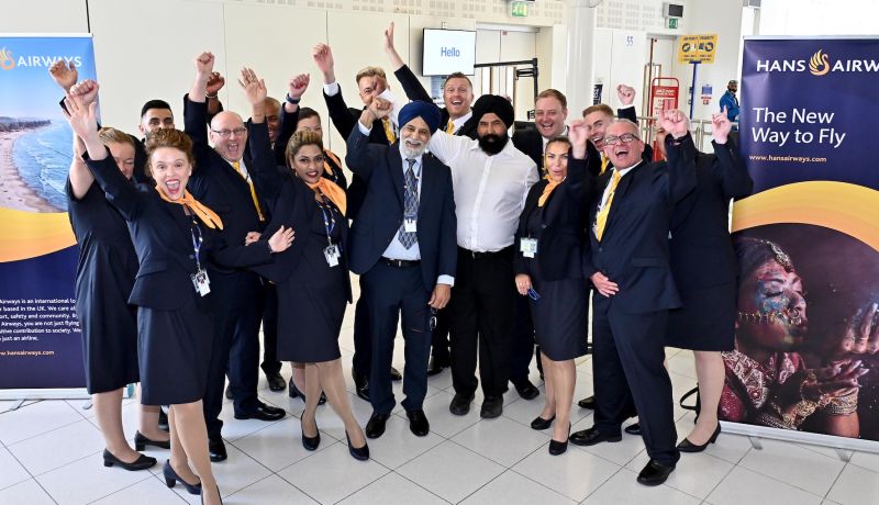 The Hans Airways Staff cheering