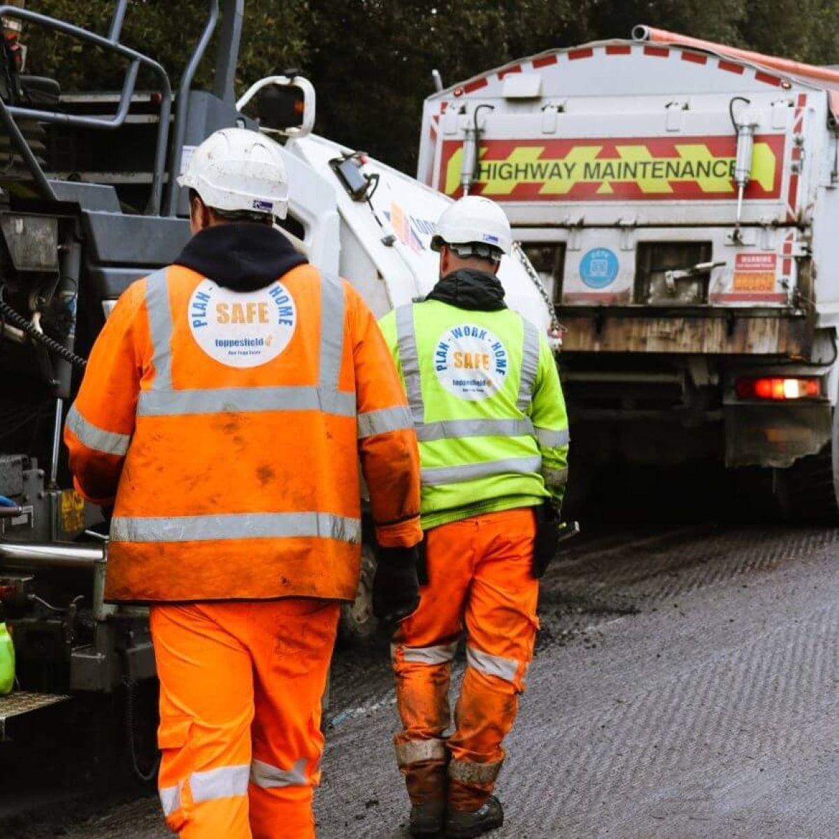 Toppesfield workers behind a asphalt lorry