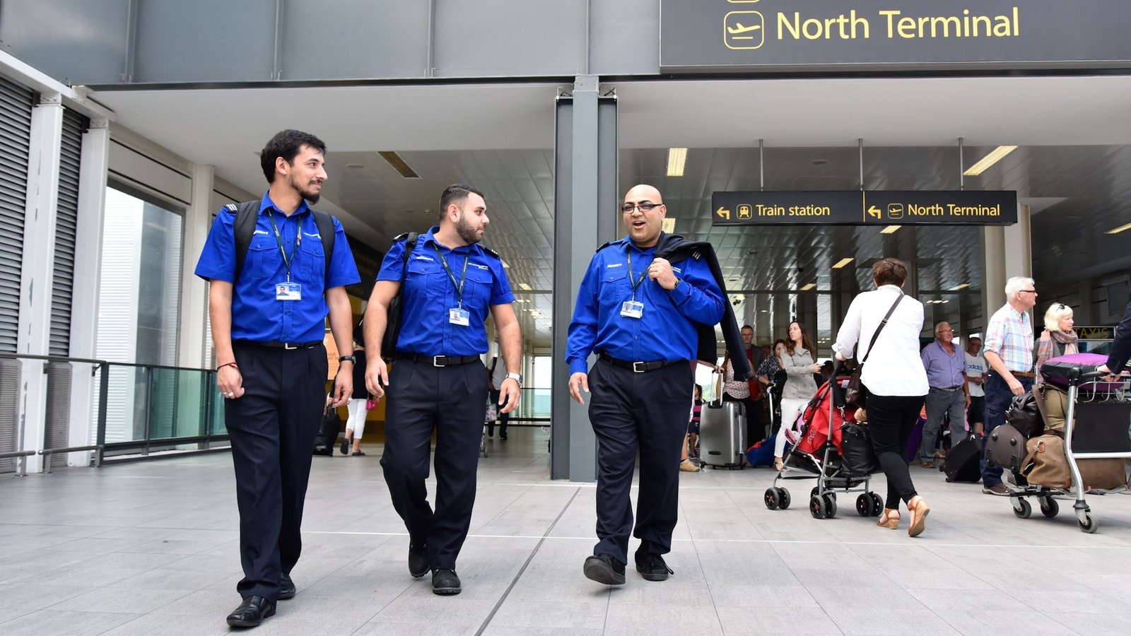 3 security officers outside Gatwick Terminal