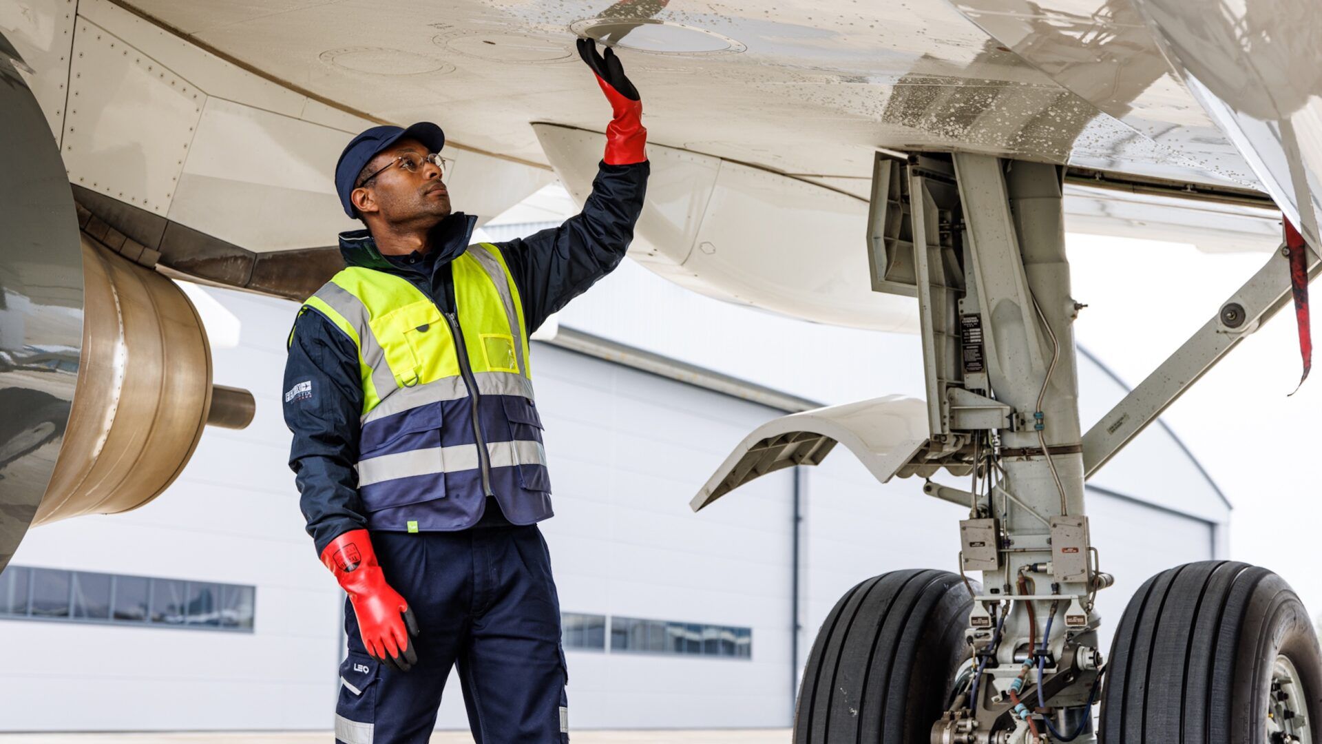 Ramp operator checking under plane