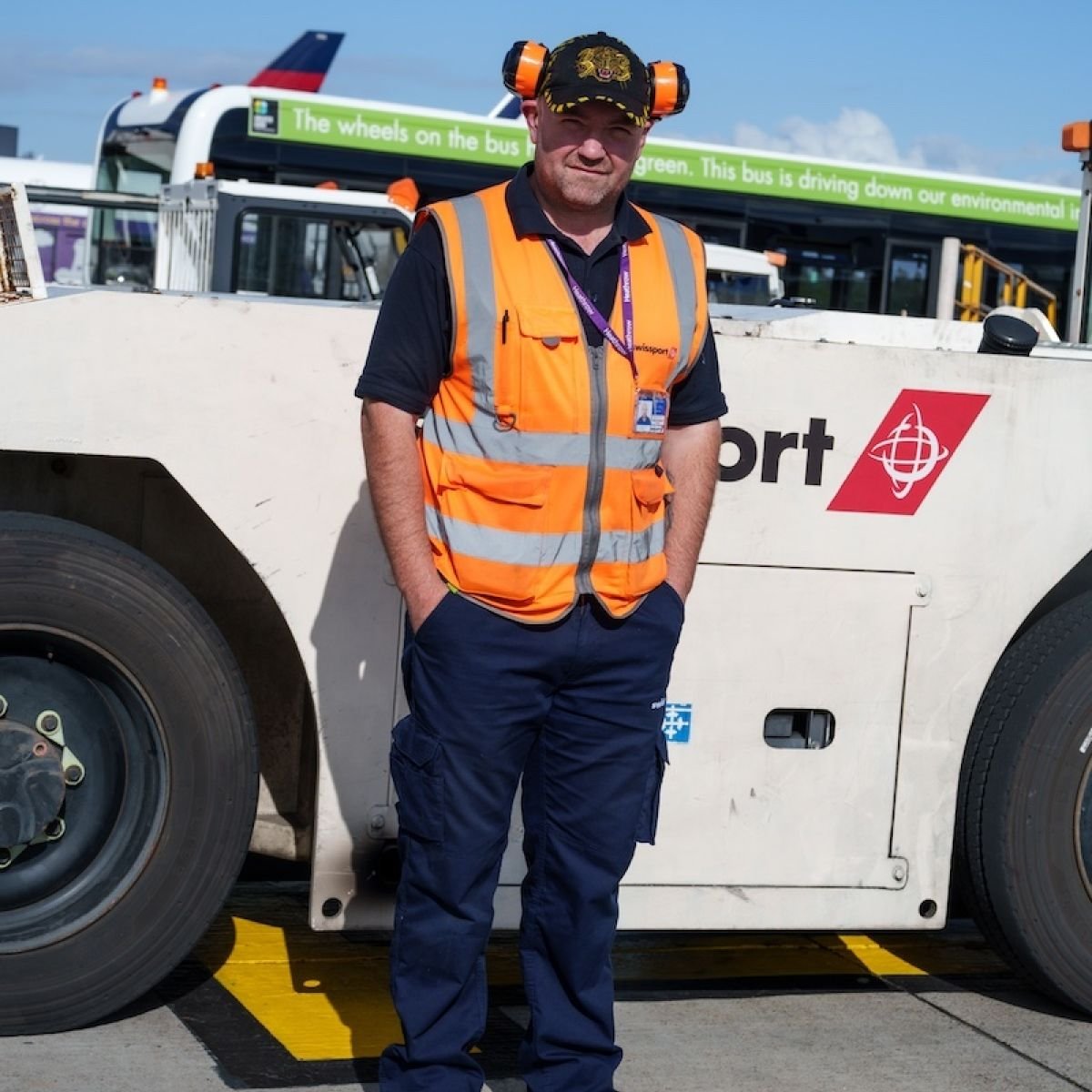 Swissport Ramp Agent in orange hi-vis