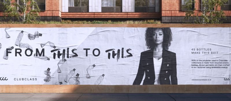 Advert for recycled bottles to clothing on a billboard.