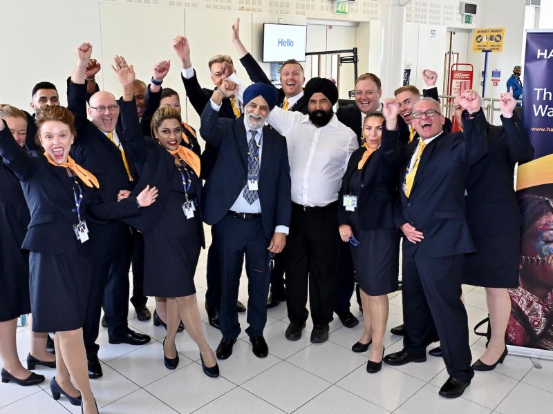 The Hans Airways Staff cheering