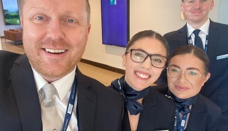 Staff at London Oxford Airport in new uniform - 2 men, 2 ladies - selfie style