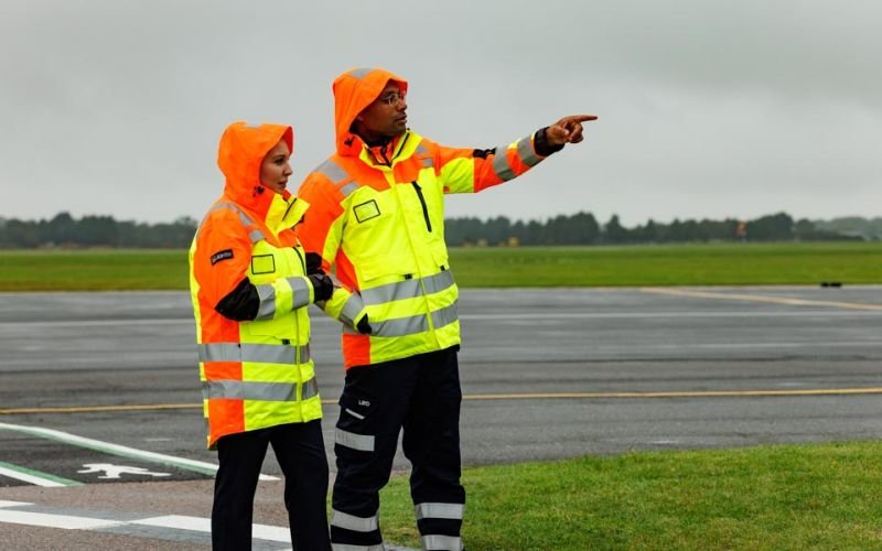 Airfield Ops wearing Airlite jacket on ramp