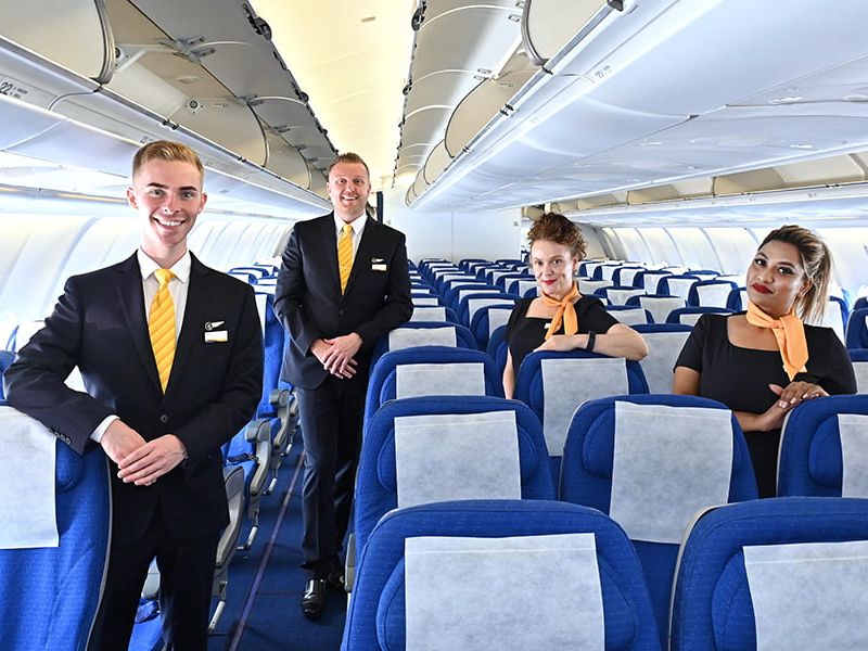 Hans Airways flight crew on plane.