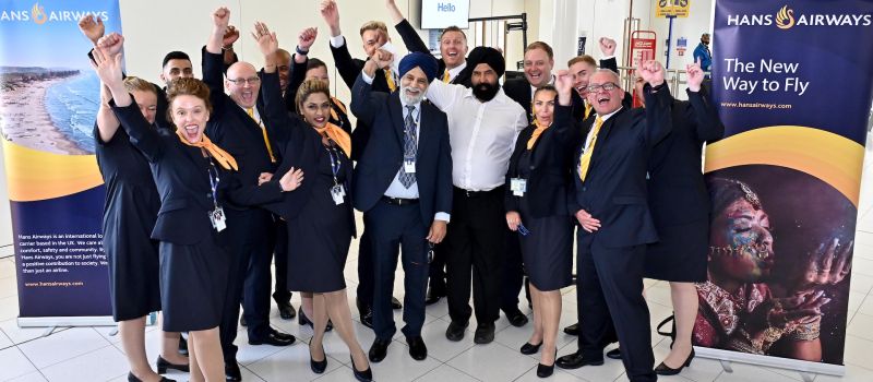 The Hans Airways Staff cheering